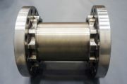 SCREW CONVEYOR SPOOL WITH CARBIDE WELD OVERLAY
